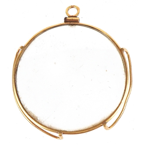 300 - An antique French 18K gold monocle, 4.5cm high, 7.3g.