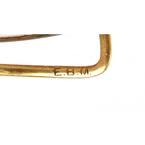 300 - An antique French 18K gold monocle, 4.5cm high, 7.3g.