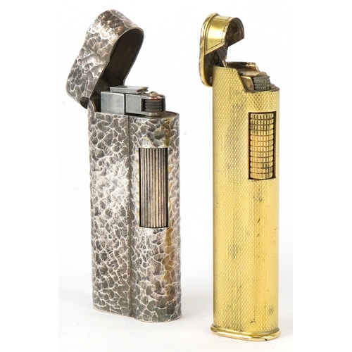 1560 - Two Dunhill pocket lighters, one with planished decoration, the largest 7.3cm high.
