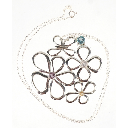 3555 - A sterling silver floral multi gem pendant on a silver necklace, 4.5cm high and 44cm in length, tota... 