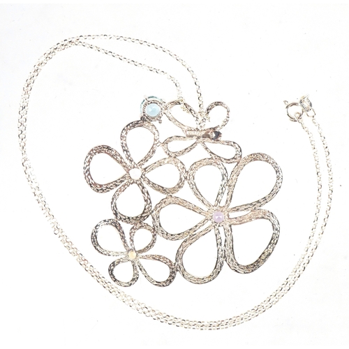 3555 - A sterling silver floral multi gem pendant on a silver necklace, 4.5cm high and 44cm in length, tota... 