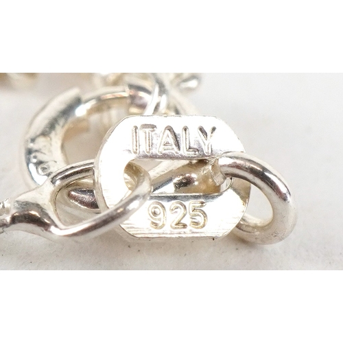 3555 - A sterling silver floral multi gem pendant on a silver necklace, 4.5cm high and 44cm in length, tota... 