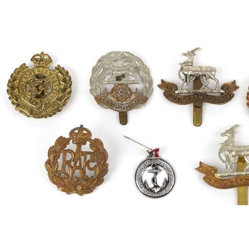 2826 - British militaria including a Christmas 1914 Mary tin, cap badges and a Metropolitan Police whistle.