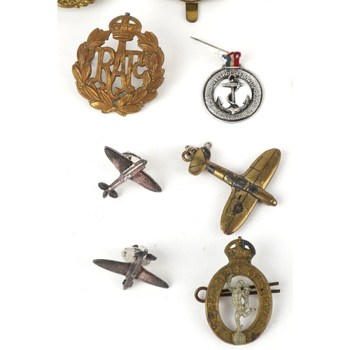 2826 - British militaria including a Christmas 1914 Mary tin, cap badges and a Metropolitan Police whistle.