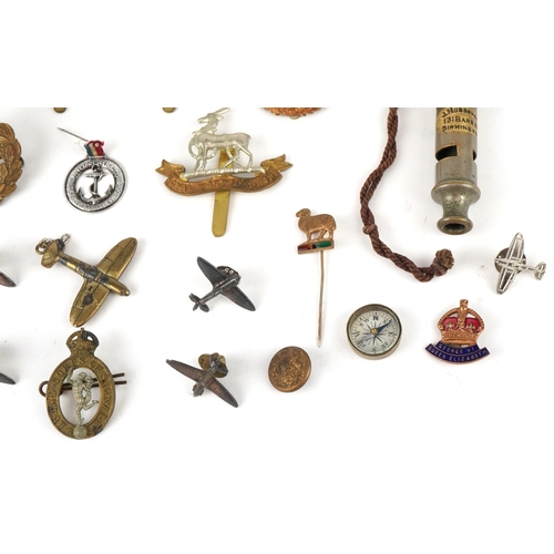 2826 - British militaria including a Christmas 1914 Mary tin, cap badges and a Metropolitan Police whistle.