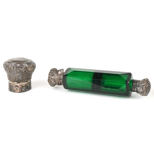 306 - Three Victorian glass scent bottles including two double ended examples, the largest 12cm in length.