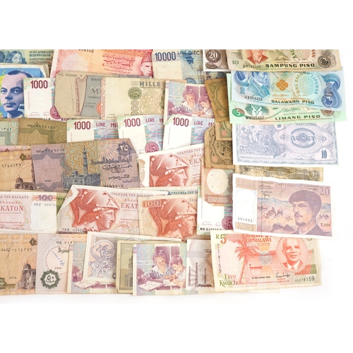1216 - A large quantity of vintage world banknotes including Italy, Belgium, Austria, Germany, Greece, Bulg... 