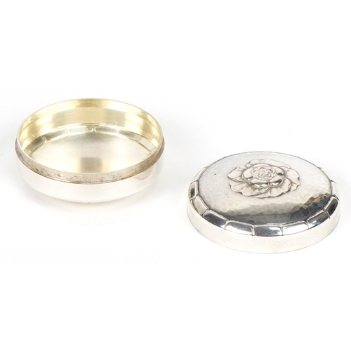 3740 - A Georg Jensen Danish sterling silver pillbox with embossed flower decoration, 3.7cm in diameter, 20... 