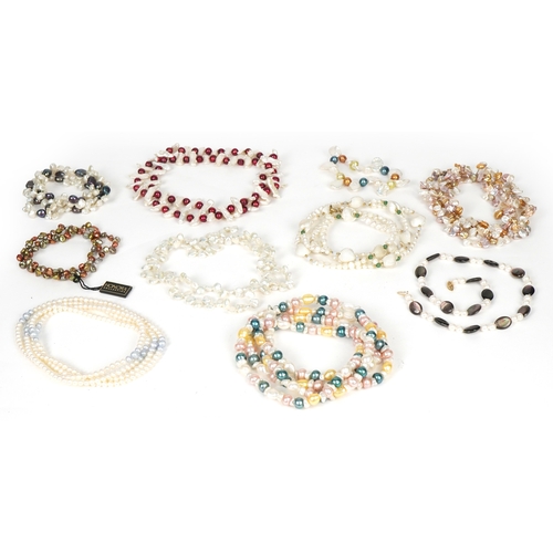 3557 - A large collection of freshwater pearl necklaces and bracelets in various colours including Honora C... 