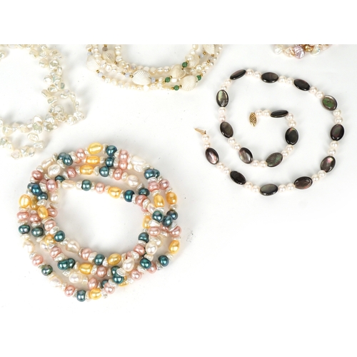3557 - A large collection of freshwater pearl necklaces and bracelets in various colours including Honora C... 