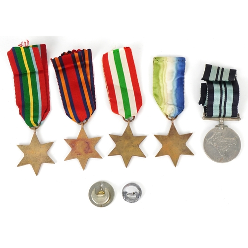 2694 - Five British military World War II medals and two cap badges including the Italy Star, the Pacific S... 