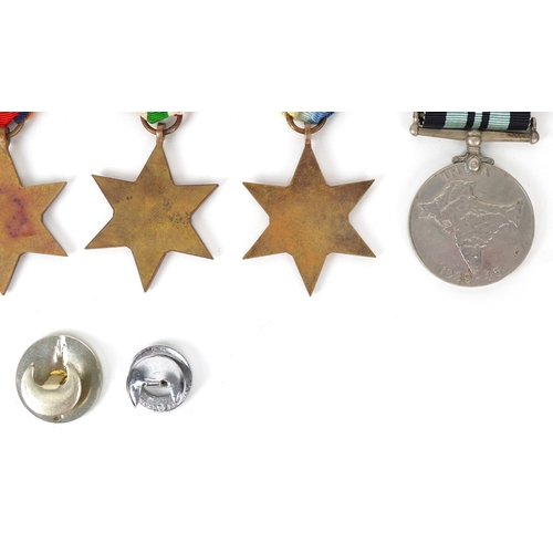 2694 - Five British military World War II medals and two cap badges including the Italy Star, the Pacific S... 