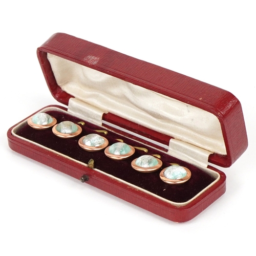 298 - A set of six gilt metal and enamel gentlemen's dress studs by Lambourne & Co. Birmingham, housed in ... 
