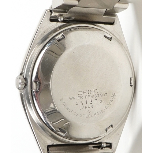 3540 - WITHDRAWN A Seiko automatic wristwatch having a Mickey Mouse design dial with day/date aperture, the... 