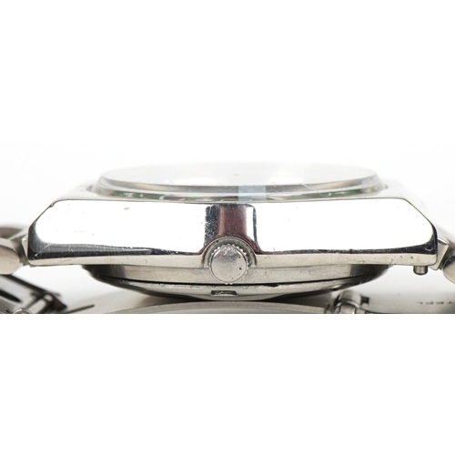 3540 - WITHDRAWN A Seiko automatic wristwatch having a Mickey Mouse design dial with day/date aperture, the... 