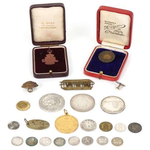 1172 - A collection of antique and later world coins and medallions, some silver, including Chinese coins, ... 