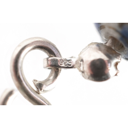 3087 - A Chinese porcelain bead necklace with hand painted floral decoration and a silver clasp, 49cm in le... 