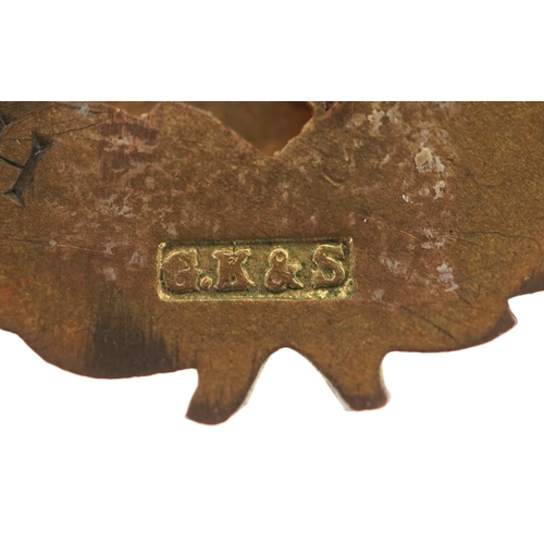 3158 - A gilt metal and enamel St. George pendant, 3.8cm in diameter, 18.8g.