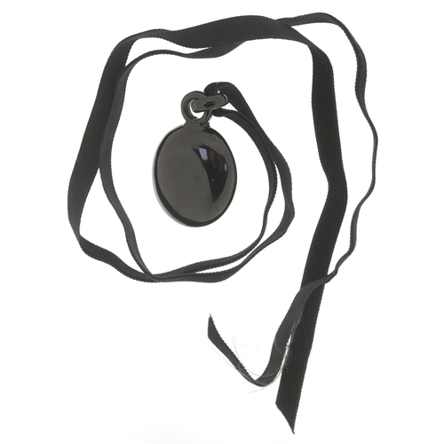 3330 - A Victorian cameo jet pendant carved in high relief with a maiden head, 5cm high, 14.5g.