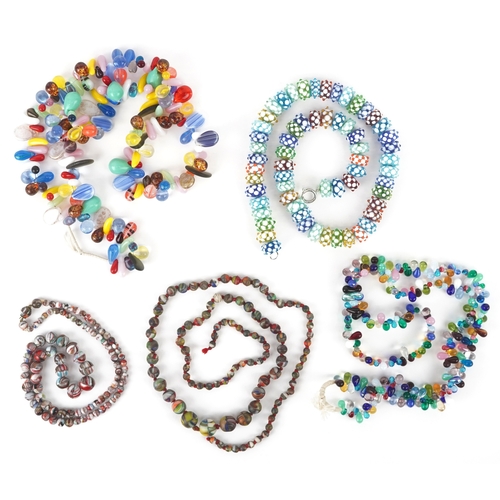 3333 - A collection of 20th century bead necklaces including Czech glass Mali wedding beads, the largest 78... 