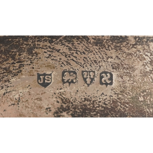 3264 - Joseph Smith & Sons, a Victorian style silver bangle with engraved floral decoration, Chester 1948, ... 