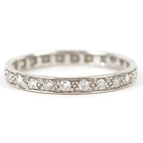3211 - An 18K white gold diamond eternity ring, size Q, 1.8g.