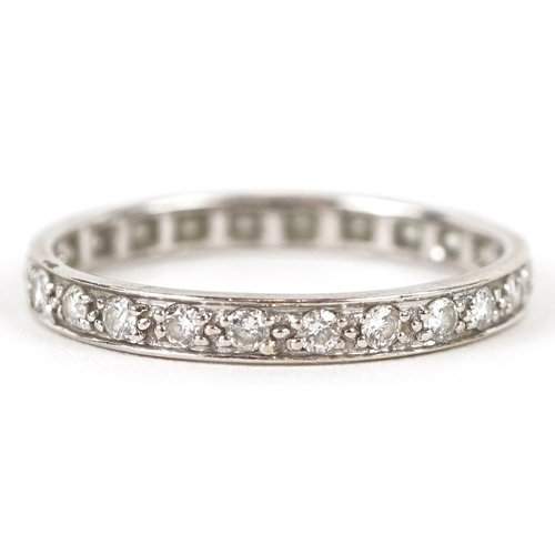 3211 - An 18K white gold diamond eternity ring, size Q, 1.8g.