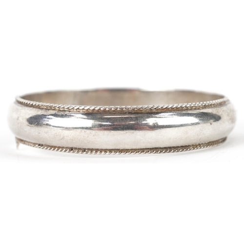 3225 - A silver hinged bangle, 6.8cm in diameter, 20.4g.