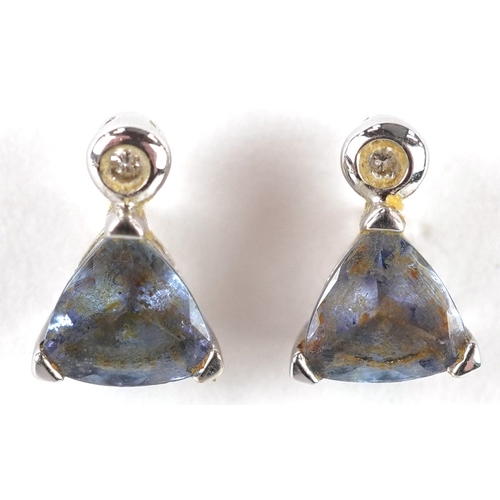 3105 - A pair of 9ct white gold diamond and blue stone stud earrings, 7.9mm high, total 1.0g.