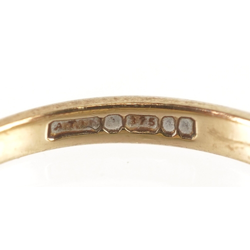 3269 - A 9ct gold diamond solitaire ring, size L/M, 1.9g.