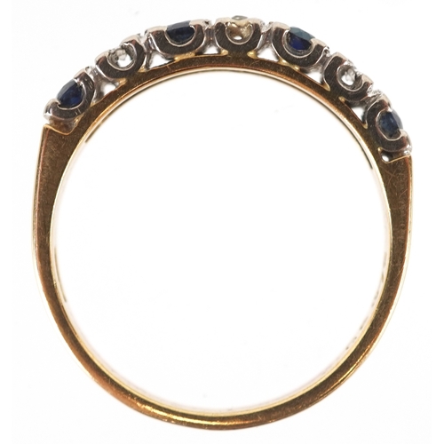 3201 - An 18ct gold diamond and blue spinel half eternity ring, size K, 2.8g.