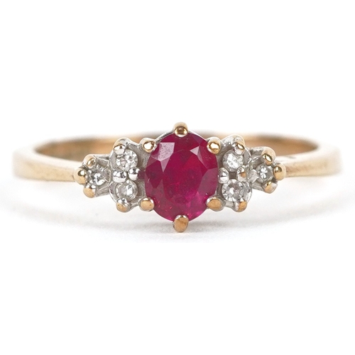 3220 - A 9ct gold ruby solitaire ring with diamond set shoulders, size N, 2.2g.