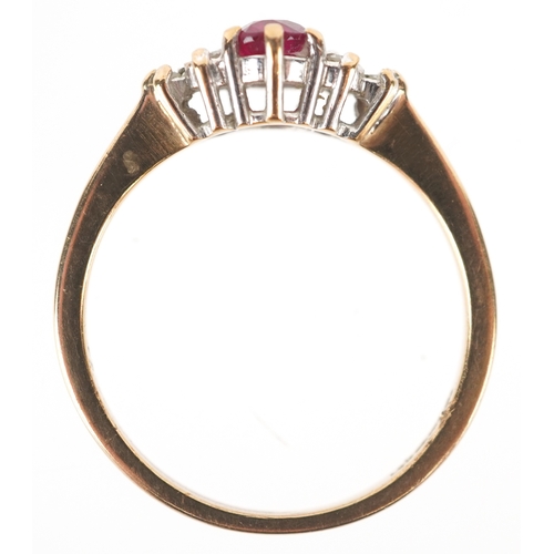 3220 - A 9ct gold ruby solitaire ring with diamond set shoulders, size N, 2.2g.