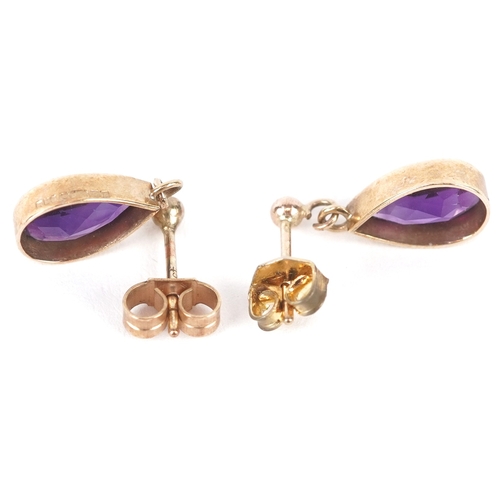 3089 - Two pairs of 9ct gold earrings comprising a pair of paste horseshoe design screw back earrings and a... 