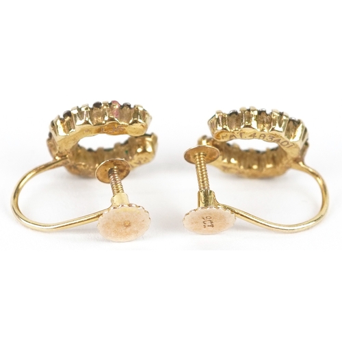 3089 - Two pairs of 9ct gold earrings comprising a pair of paste horseshoe design screw back earrings and a... 