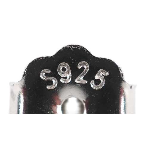 3197 - A pair of silver rutilated quartz stud earrings, 8.1mm high, total 1.7g.