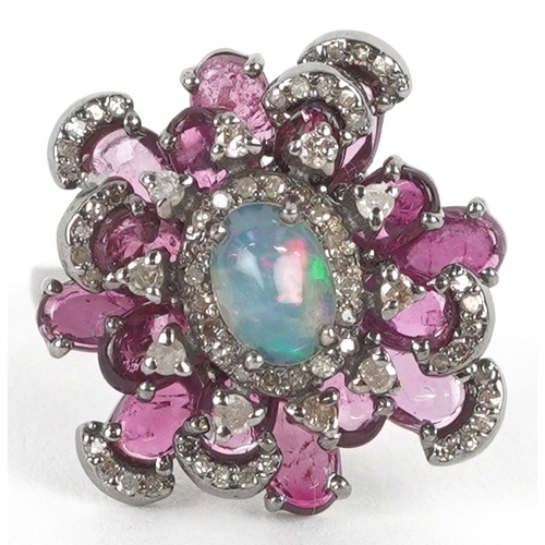 3253 - A silver cabochon opal pink tourmaline and diamond cluster ring, total diamond weight 0.40 carat, to... 