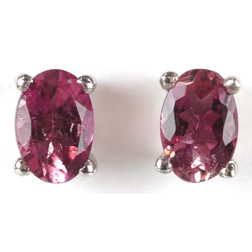 3361 - A pair of silver pink tourmaline stud earrings, 5.8mm high, total 1.1g.