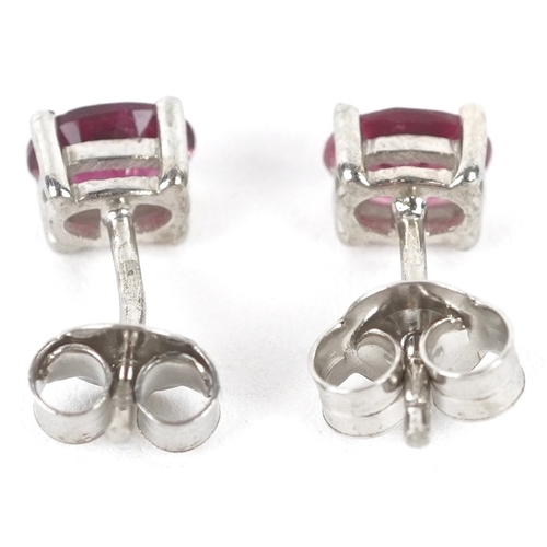 3361 - A pair of silver pink tourmaline stud earrings, 5.8mm high, total 1.1g.
