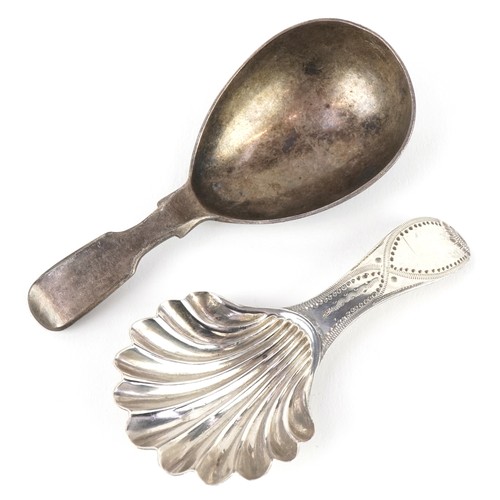 3668 - Two Georgian and later silver caddy spoons, one with shell shaped bowl, the largest 8.5cm in length,... 