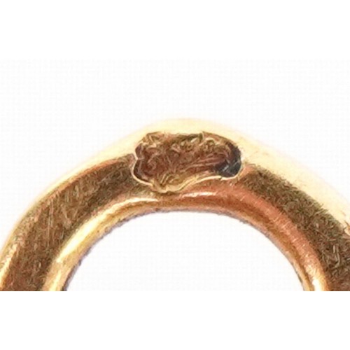 300 - An antique French 18K gold monocle, 4.5cm high, 7.3g.