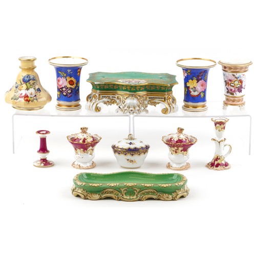 434 - 19th century English porcelain including a clock stand, spill vases and a chamber stick, each with h... 