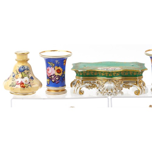 434 - 19th century English porcelain including a clock stand, spill vases and a chamber stick, each with h... 