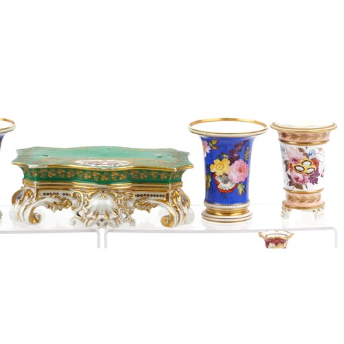 434 - 19th century English porcelain including a clock stand, spill vases and a chamber stick, each with h... 