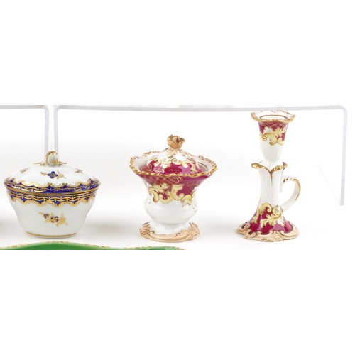 434 - 19th century English porcelain including a clock stand, spill vases and a chamber stick, each with h... 