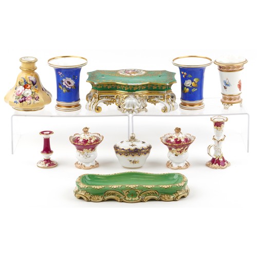 434 - 19th century English porcelain including a clock stand, spill vases and a chamber stick, each with h... 