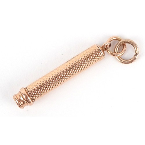 52 - A Tiffany & Co. 18ct gold cased engine turned propelling pencil 7cm in length extended, 7.5g.