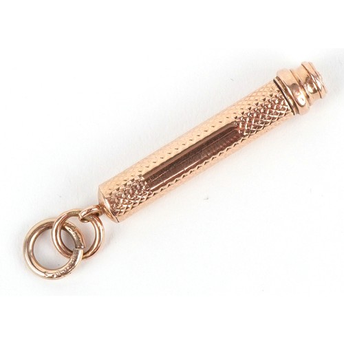 52 - A Tiffany & Co. 18ct gold cased engine turned propelling pencil 7cm in length extended, 7.5g.