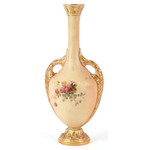 320 - A Victorian Royal Worcester blush ivory twin handled vase decorated with flowers, numbered 2338, 23c... 