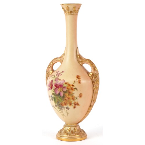 320 - A Victorian Royal Worcester blush ivory twin handled vase decorated with flowers, numbered 2338, 23c... 